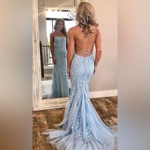 light blue open back dress. never worn.